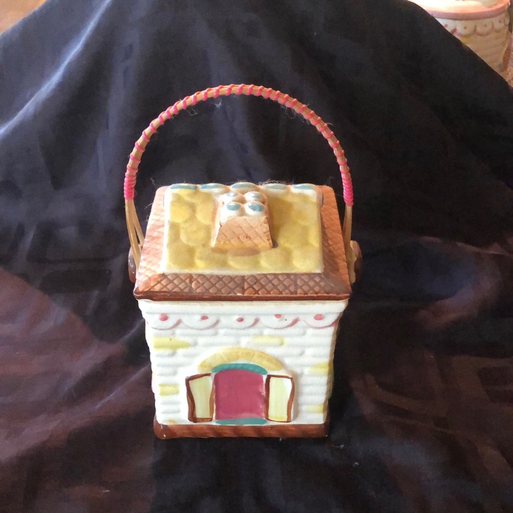 Charming Ceramic House Accent with Pink and Yellow Details